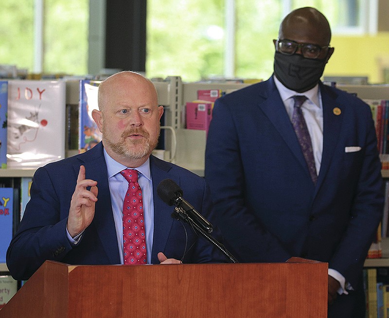 Chief Education Officer Dr. Jay Barth and Mayor Frank Scott, Jr., right, announce several key education initiatives Thursday Sept. 3, 2020 in Little Rock during a press conference at the Hillary Rodham Clinton Children's Library. (Arkansas Democrat-Gazette/Staton Breidenthal)