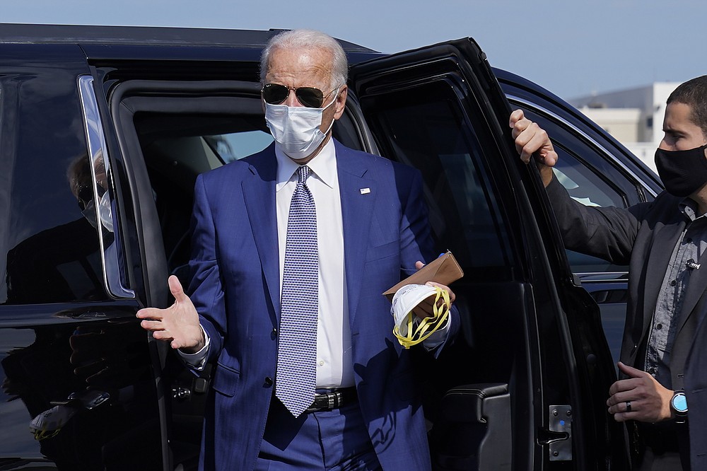 Visiting Wisconsin, Biden talks of watershed on race