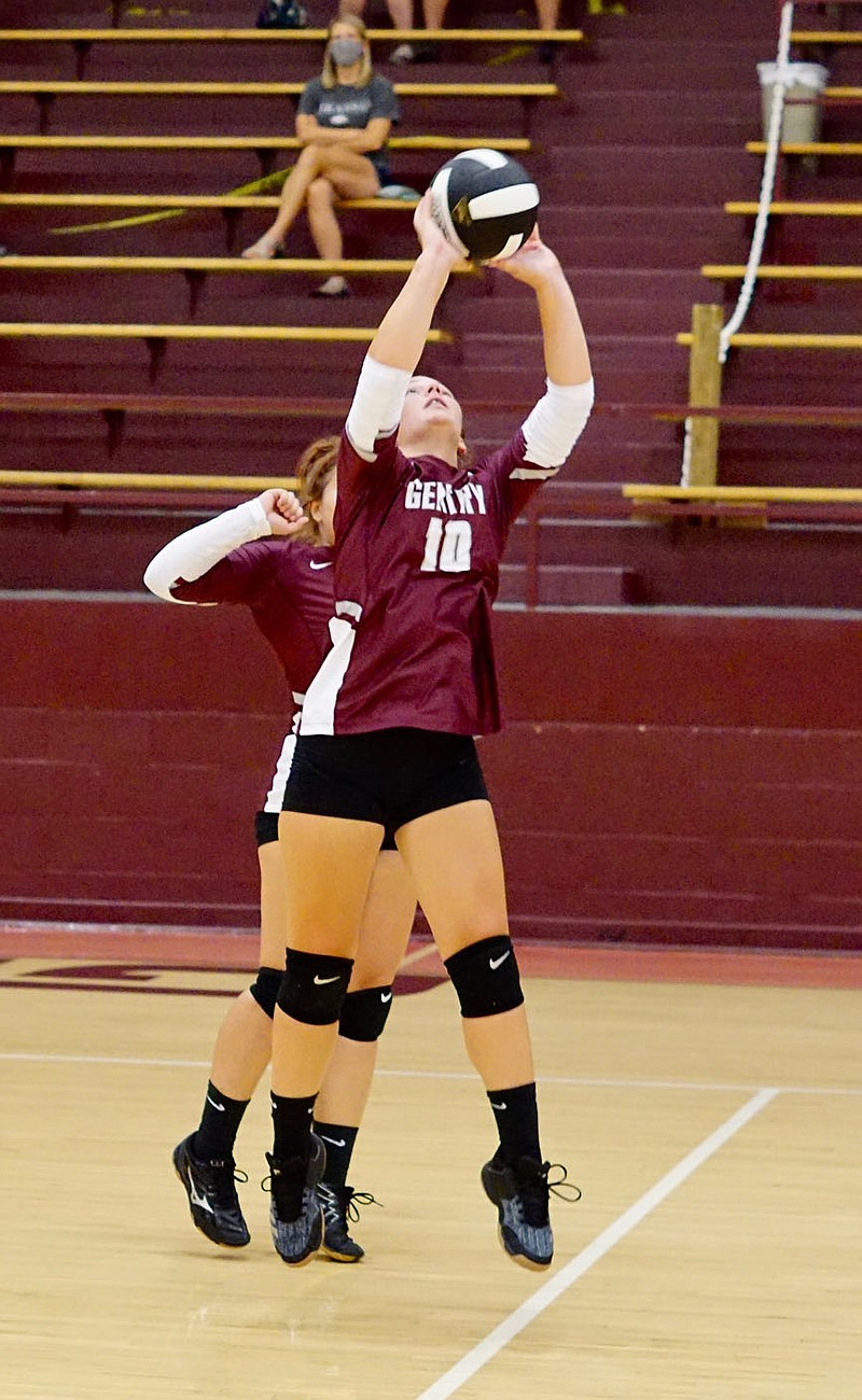 Westside Eagle Observer/RANDY MOLL Gentry's Madison Voyles sets the ball during play against Berryville on Sept. 1 at Gentry High School.