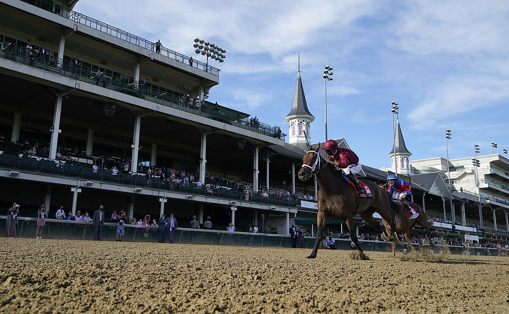 Long shot pulls off Oaks record