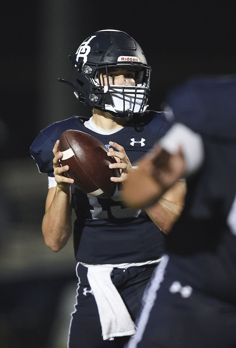 Har-Ber quarterback Drue McClendon (15) looks to pass, Friday, September 4, 2020 during a football game at Springdale Har-Ber High School in Springdale. North Little Rock leads 21-17 at the half. Check out nwaonline.com/200905Daily/ for today's photo gallery. 
(NWA Democrat-Gazette/Charlie Kaijo)