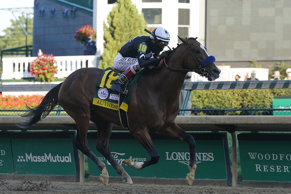 Jockey John Velazquez riding Authentic heads to the finish line to win the 146th running of the Kentucky Derby at Churchill Downs, Saturday, Sept. 5, 2020, in Louisville, Ky. (AP Photo/Darron Cummings)