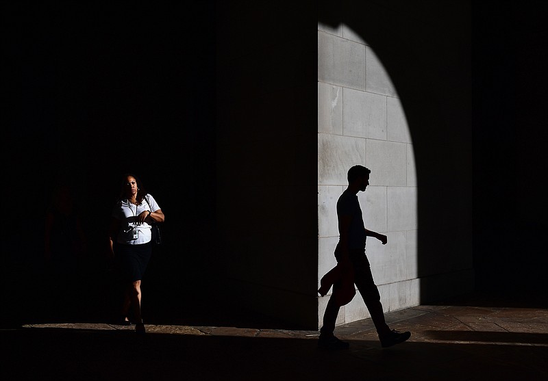 Autumn light illuminates a corner in D.C. in October 2019. MUST CREDIT: Washington Post photo by Matt McClain