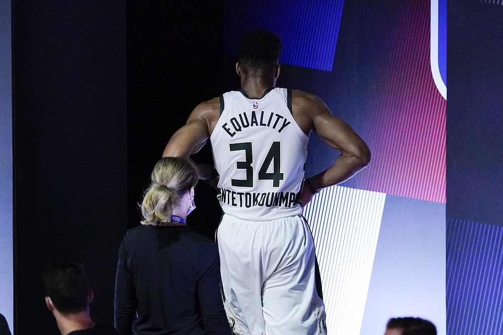 Bucks live for another day, turn down Heat in overtime
