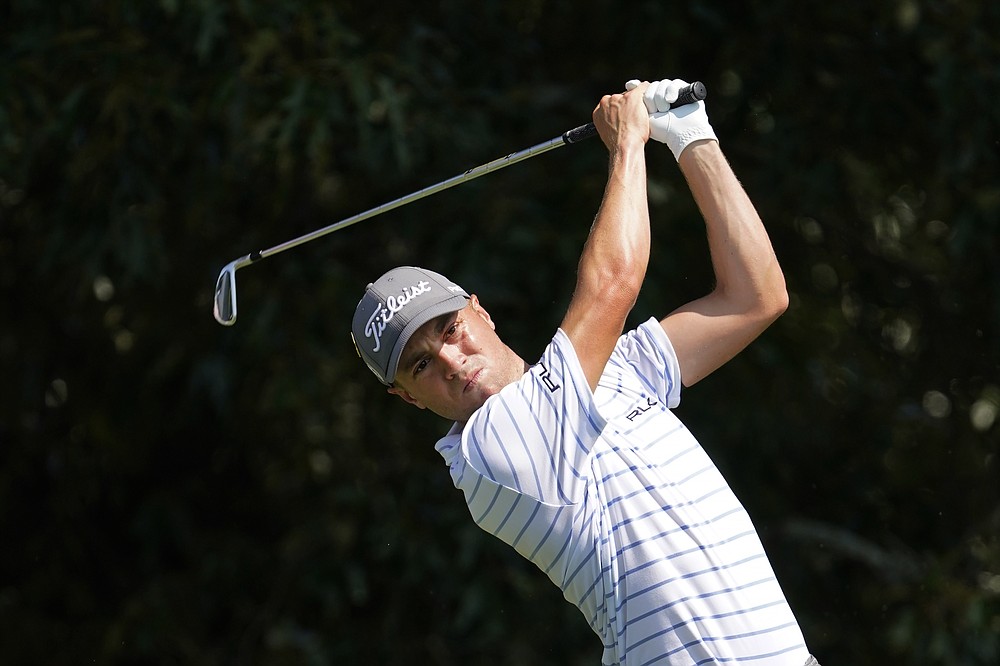 Justin Thomas hits from the tee on the third hole during the third round of play in the Tour Championship golf tournament at East Lake Golf Club Sunday, Sept. 6, 2020, in Atlanta. (AP Photo/John Bazemore)