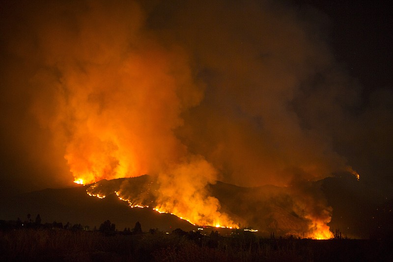 Wildfire Overruns Camping Area