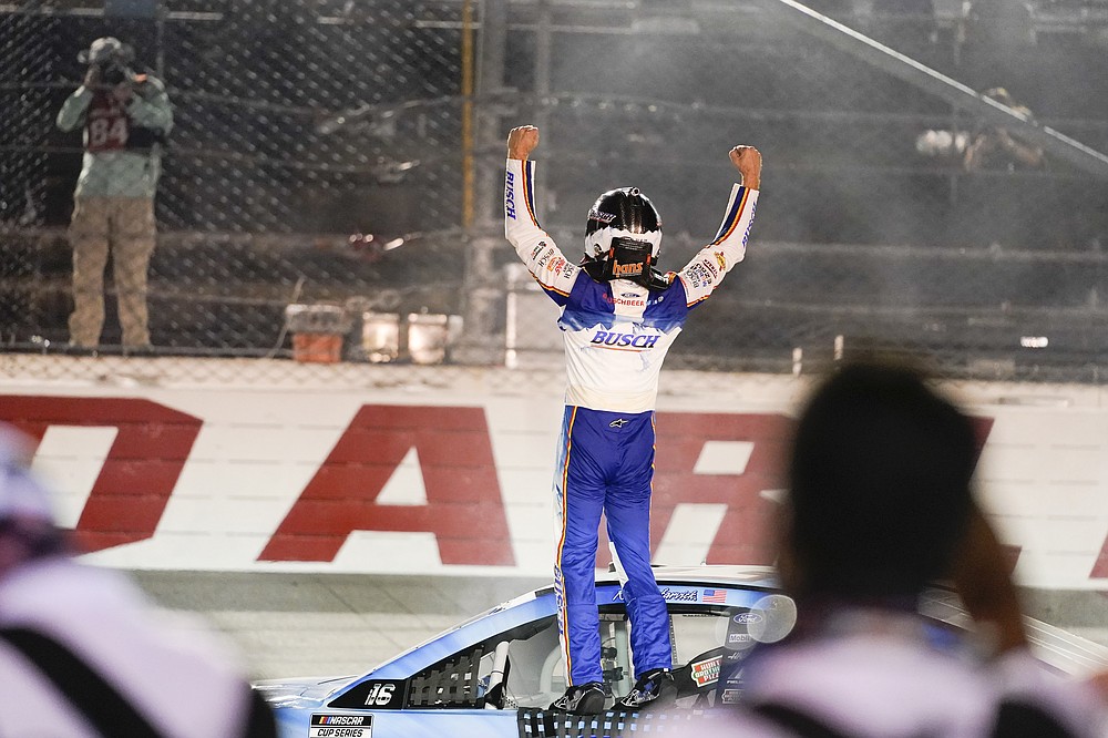 Kevin Harvick (4) celebrates a win at the NASCAR Cup Series auto race, Sunday, Sept. 6, 2020, in Darlington, S.C. (AP Photo/Chris Carlson)