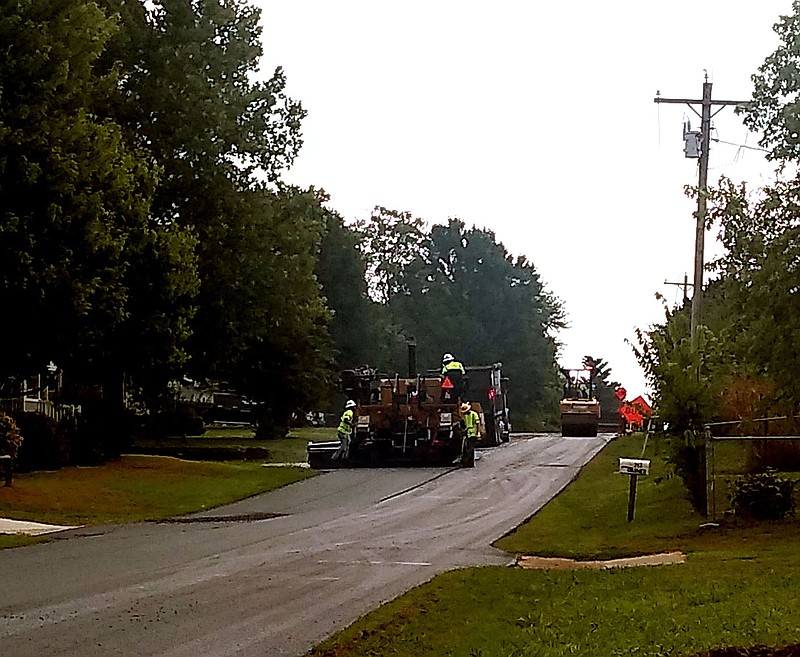 PHOTO SUBMITTED
APAC-Central Inc. works to repave Garner Street last week. B Avenue and Janice Street were also repaved.