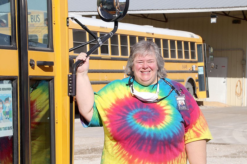 LYNN KUTTER ENTERPRISE-LEADER
Renee Robinson has driven a school bus for 14 years, eight years in Farmington and now in Prairie Grove for six years. She said her students are doing a great job on the bus. They are  wearing their masks and washing their hands each time with hand sanitizer. Districts in the area have a shortage of bus drivers because of covid-19 concerns.