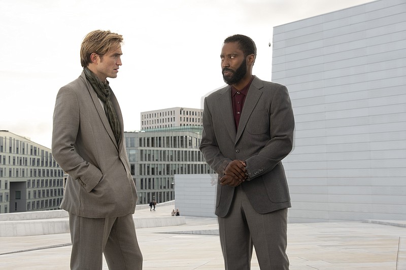 Robert Pattinson and John David Washington star in Christopher Nolan’s “Tenet,” critic Keith Garlington’s pick as the top movie of 2020.