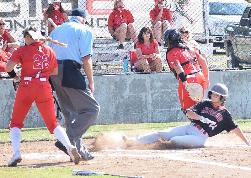 RICK PECK/SPECIAL TO MCDONALD COUNTY PRESS
McDonald County's Katelynn Townsend scores a run during the Lady Mustangs' 9-2 win over Ozark on Sept. 5 at MCDonald County High School.