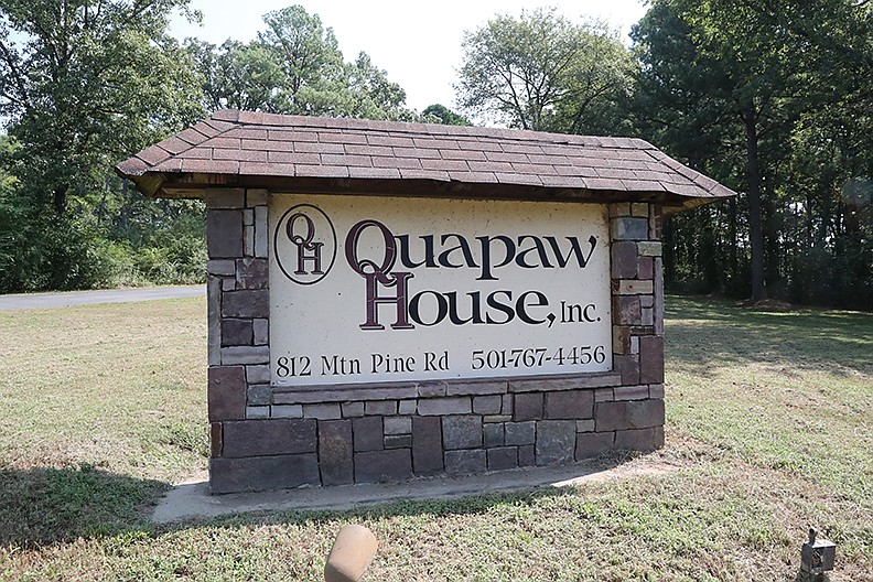 A sign marks the location of the Quapaw House Mountain Pine Road facility on Wednesday. - Photo by Richard Rasmussen of The Sentinel-Record