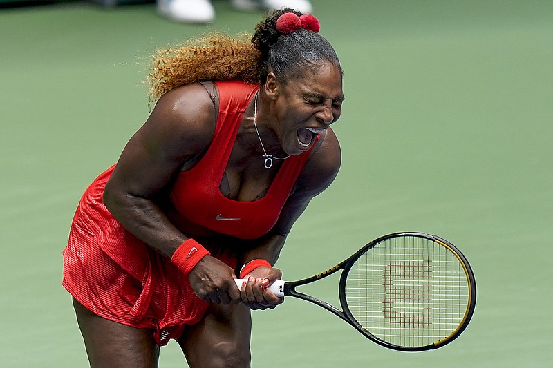 Serena Williams, of the United States, reacts during a match against Tsvetana Pironkova, of Bulgaria, during the quarterfinals of the US Open tennis championships, Wednesday, Sept. 9, 2020, in New York. (AP Photo/Seth Wenig)