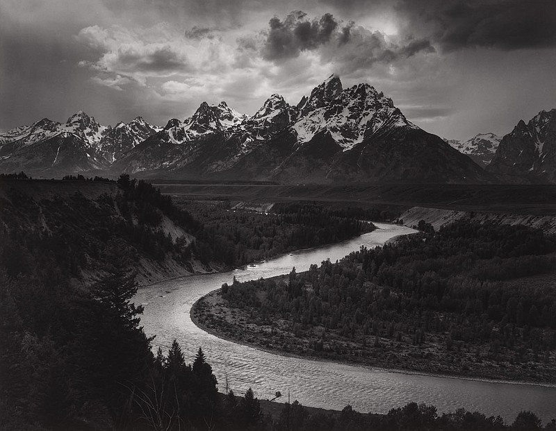 Famed Ansel Adams photograph “The Tetons and Snake River, Grand Teton National Park, Wyoming” was one of only 115 images chosen (along with another piece by Adams) to represent human life and culture on NASA’s 1977 Voyager, mission where two spacecrafts were sent to interstellar space carrying a small database representative of humanity.

“That’s a pretty bold statement to be able to select just a specific number of objects speak to humanity more holistically — that’s a wild endeavor,” enthuses Alejo Benedetti, contemporary curator at Crystal Bridges. “I actually had not known that his work was out in space, so of course I loved that little tidbit.”

(Museum of Fine Arts, Boston. The Lane Collection/Copyright The Ansel Adams Publishing Rights Trust)

(Courtesy Photo/Museum of Fine Arts, Boston)