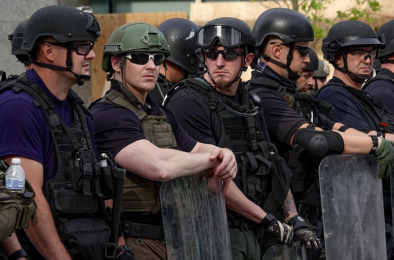 Federal agents during protests in Washington on June 3. (Washington Post photo by Bonnie Jo Mount)