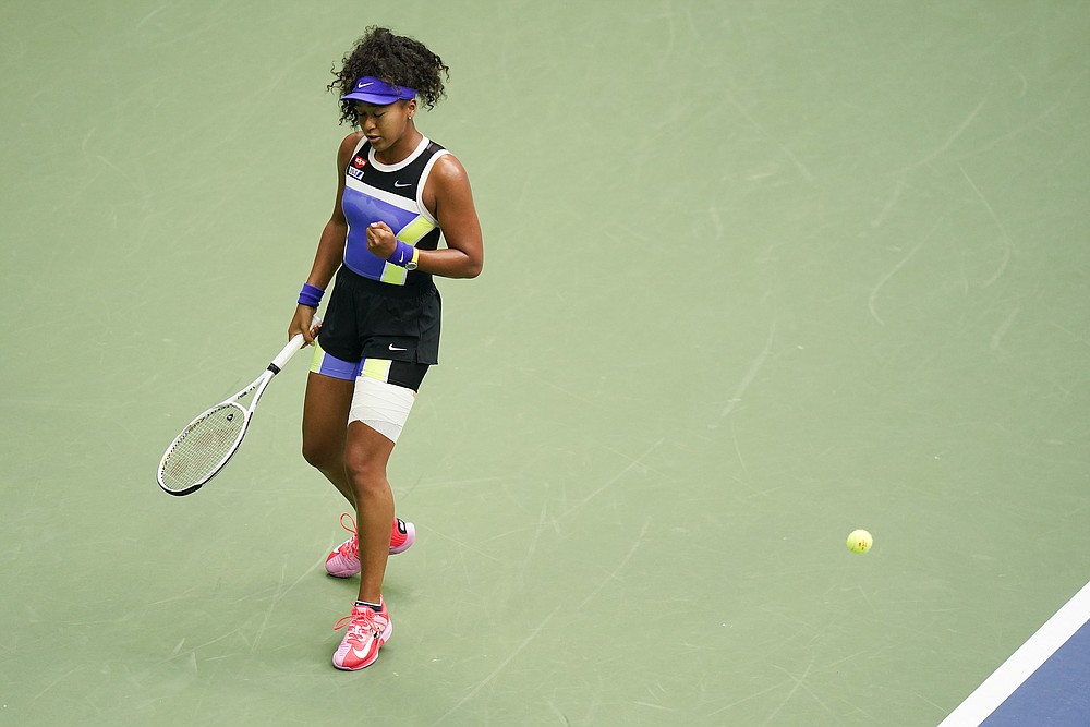 Naomi Osaka, of Japan, reacts during the women's singles final against Victoria Azarenka, of Belarus, during the US Open tennis championships, Saturday, Sept. 12, 2020, in New York. (AP Photo/Frank Franklin II)