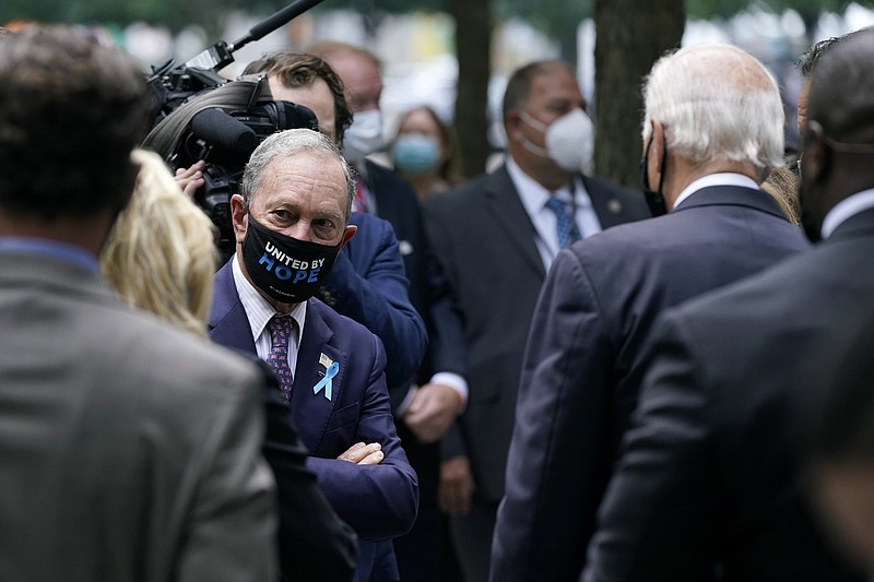 Former New York Mayor Michael Bloomberg, left, visits with Democratic presidential candidate and former Vice President Joe Biden at the National September 11 Memorial in New York, Friday, before a ceremony marking the 19th anniversary of the Sept. 11 terrorist attacks. - AP Photo/Patrick Semansky