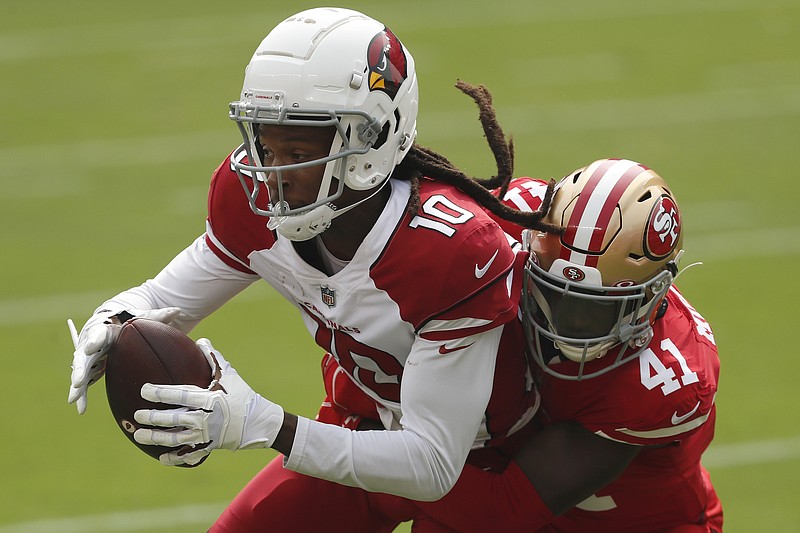 Hopkins plays key role in Cardinals' victory