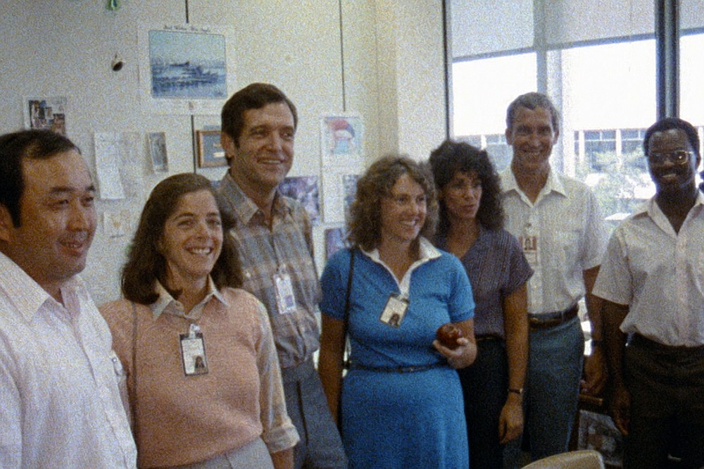 This image released by Netflix shows members of the Challenger 7 crew, from left, Ellison S. Onizuka; Barbara Morgan, Dick Scobee, Christa McAuliffe, Judith Resnik, Mike Smith, and Ronald McNair in episode 2 of "Challenger: The Final Flight." The four-part series about the 1986 Challenger space shuttle disaster premieres Wednesday. (NASA/Netflix via AP)