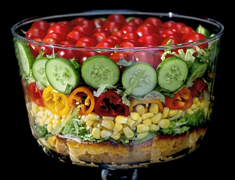 Summer Trifle Salad Built layers savory cornbread, shredded romaine lettuce, sweet corn, mini peppers, cucumbers and cherry tomatoes. (Pittsburgh Post-Gazette/TNS/Steve Mellon)