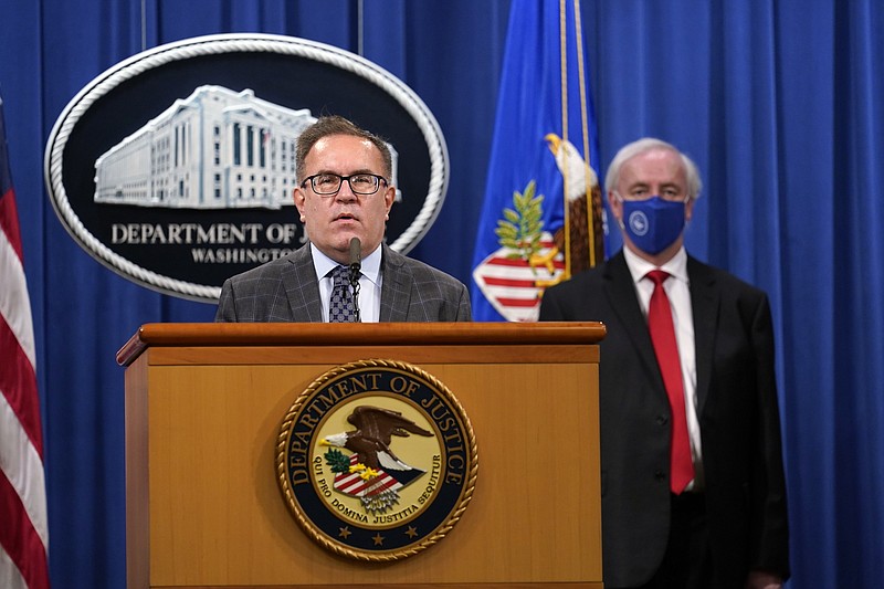 Environmental Protection Agency (EPA) Administrator Andrew Wheeler speaks, left, as Deputy Attorney General Jeffrey Rosen and looks on, during a news conference at the Justice Department in Washington, Monday, Sept. 14, 2020. Automakers Daimler AG and subsidiary Mercedes-Benz USA have agreed to pay $1.5 billion to the U.S. government and California state regulators to resolve emissions cheating allegations. (AP Photo/Susan Walsh, Pool)