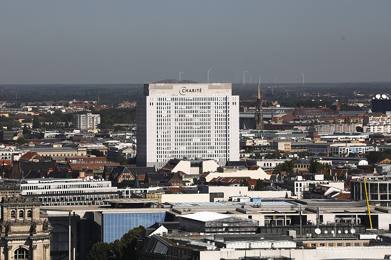 The sun shines on the central Charite building where Russian opposition leader Alexei Navalny is treated in Berlin, Germany, Monday, Sept. 14, 2020. The German government says specialist labs in France and Sweden have confirmed Russian opposition leader Alexei Navalny was poisoned with the Soviet-era nerve agent Novichok. (AP Photo/Markus Schreiber)