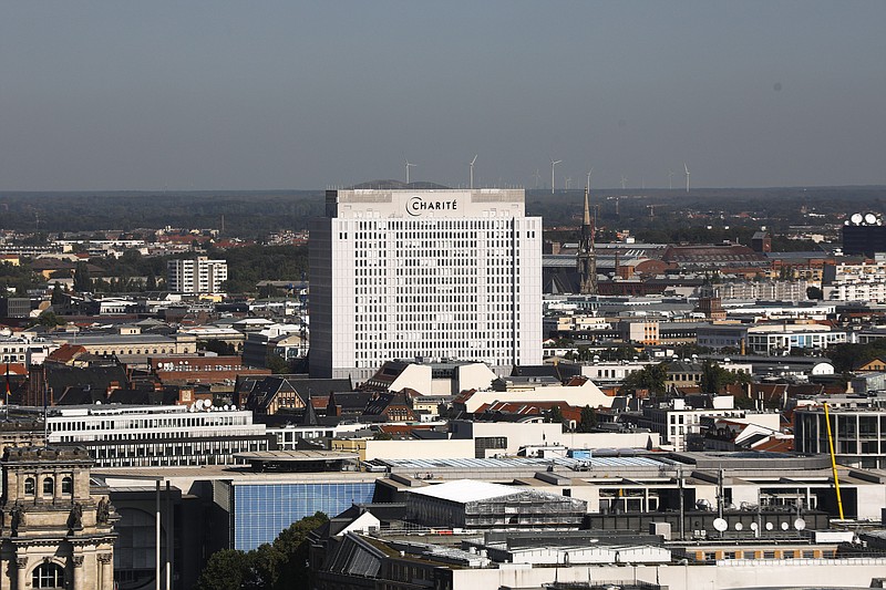 The sun shines on the central Charite building where Russian opposition leader Alexei Navalny is treated in Berlin, Germany, Monday, Sept. 14, 2020. The German government says specialist labs in France and Sweden have confirmed Russian opposition leader Alexei Navalny was poisoned with the Soviet-era nerve agent Novichok. (AP Photo/Markus Schreiber) story.lead_photo.caption