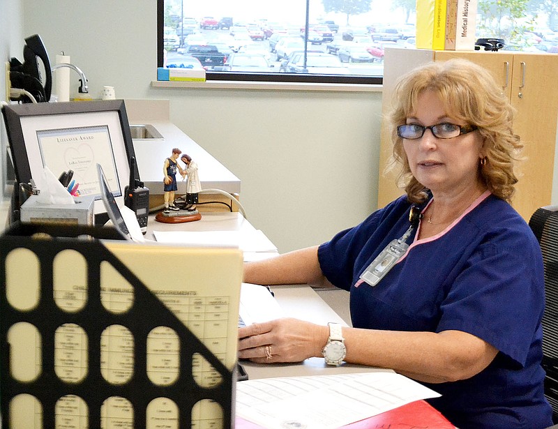 School nurse LaRay Thetford prepares for the opening of the Community Clinic at PRHS.