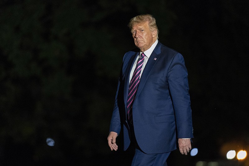 President Donald Trump walks on the South Lawn as he arrives at the White House, Monday, Sept. 14, 2020, in Washington from a trip to Phoenix. (AP Photo/Manuel Balce Ceneta)