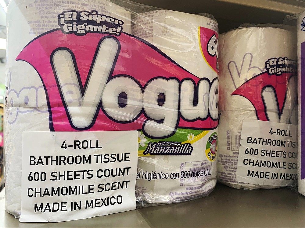 This Sept. 8, 2020, photo, shows Vogue, a Mexican toilet paper brand, on the shelf at a 7-Eleven in New York. Demand for toilet paper has been so high during the pandemic that in order to keep their shelves stocked, retailers across the country are buying up foreign toilet paper brands, mostly from Mexico. (AP Photo/Joseph Pisani)