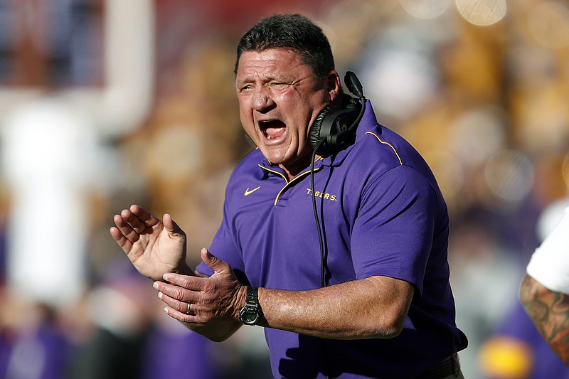 LSU head coach Ed Orgeron reacts after a LSU touchdown in the first half of a Nov. 9, 2019, NCAA game against Alabama in Tuscaloosa, Ala. Orgeron said Tuesday that most of the players on his team have contracted and recovered from COVID-19. - Photo by John Bazemore of The Associated Press story.lead_photo.caption
