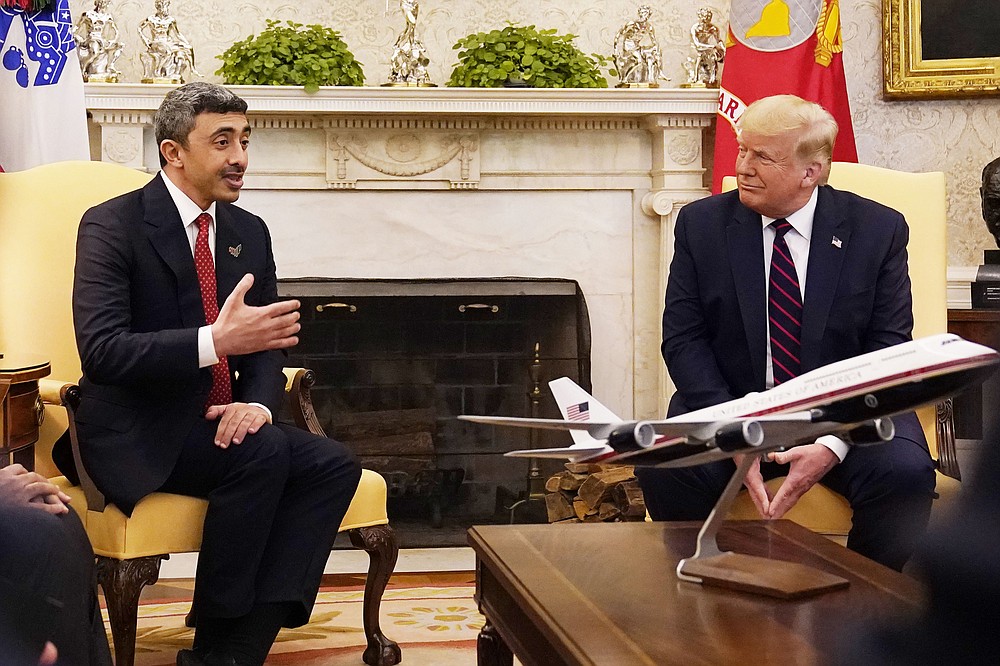 President Donald Trump meets with United Arab Emirates Foreign Minister Abdullah bin Zayed al-Nahyan in the Oval Office, Tuesday, Sept. 15, 2020, at the White House in Washington. (AP Photo/Alex Brandon)