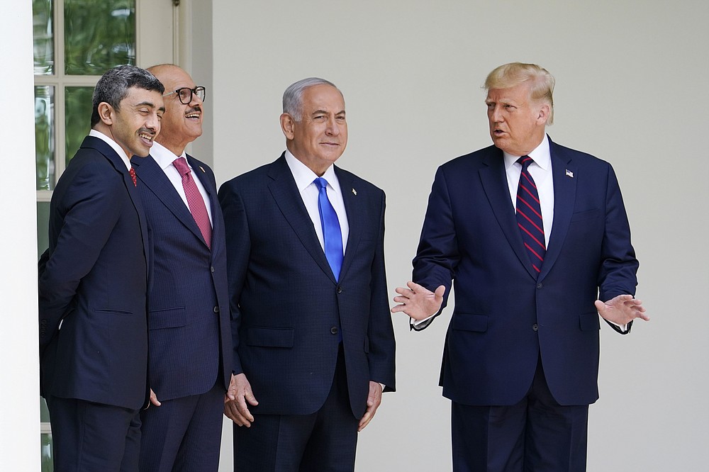 President Donald Trump walks to the Abraham Accords signing ceremony at the White House, Tuesday, Sept. 15, 2020, in Washington with Israeli Prime Minister Benjamin Netanyahu, Bahrain Foreign Minister Khalid bin Ahmed Al Khalifa and United Arab Emirates Foreign Minister Abdullah bin Zayed al-Nahyan. (AP Photo/Alex Brandon)