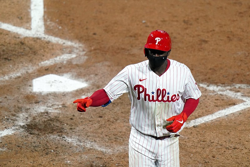Philadelphia Phillies' Didi Gregorius reacts after hitting a two-run home run off New York Mets pitcher Rick Porcello during the fifth inning of Tuesday's game in Philadelphia. - Photo by Matt Slocum of The Associated Press story.lead_photo.caption