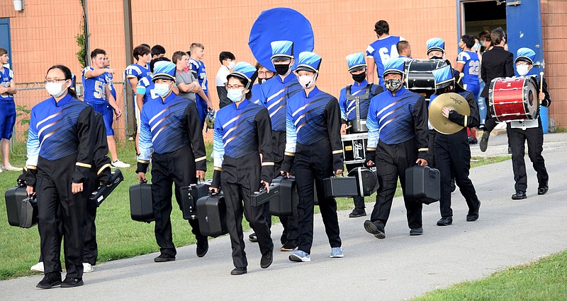 Westside Eagle Observer/MIKE ECKELS
The Decatur High School band premieres its new marching uniforms during the first home football contest at Bulldog Stadium in Decatur Sept. 11.