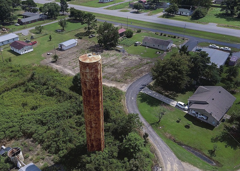 A rusted water tower marks the town of Allport Wednesday Sept. 16, 2020 in Lonoke County. The town could be the first municipality dissolved by the Legislative Joint Auditing Committee under a law passed in 2017. See more photos at arkansasonline.com/917allport/.  (Arkansas Democrat-Gazette/Staton Breidenthal)