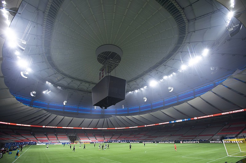 The Vancouver Whitecaps play the Montreal Impact during the second half of an MLS soccer match, in an empty B.C. Place due to COVID-19 protocols, Wednesday, Sept. 16, 2020, in Vancouver, British Columbia. (Jonathan Hayward/The Canadian Press via AP)
