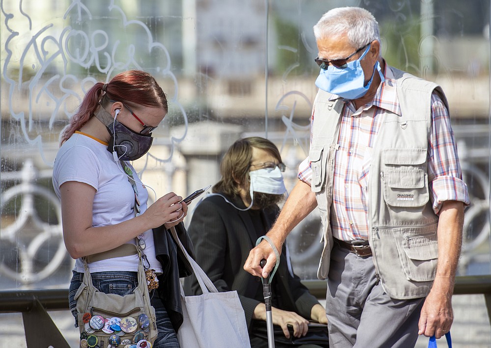 People wearing face masks as they wait at a train station in Prague, Czech Republic, Thursday, Sept. 17, 2020 The number of new confirmed coronavirus infections have hit a record in the Czech Republic, surpassing 2,000 cases in one day for the first time. (Sulova Katerina/CTKvia AP)