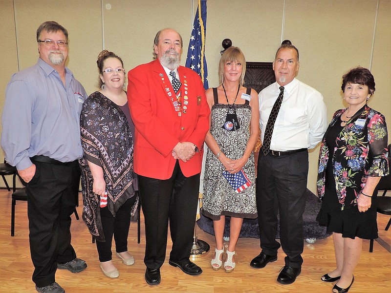From left are new Elks members Damon Miles and Michelle Miles, with Exalted Ruler Bill Sams, and Missy Tharpe, Brian LeJeune, and Pat Langley. - Submitted photo