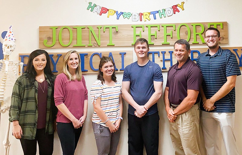 Celebrating Joint Effort Physical Therapy's second anniversary are, from left, Keely Buck, patient care coordinator, Gretchen Cellers, PTA, Megan Whitehead, DPT, Dedrick Richardson, PTA, Rob Jordan, PT, OCS, and Ryan Scroggin, student DPT. - Submitted photo