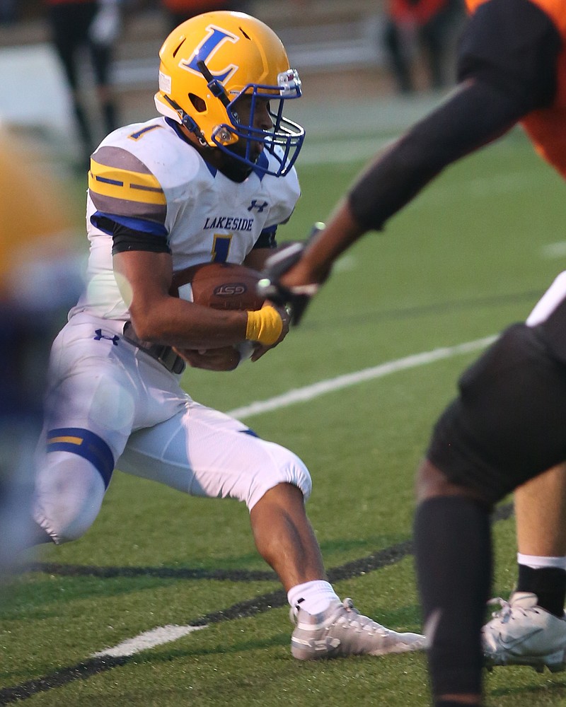 Lakeside running back Isaac Echols breaks free for positive yards in Friday's game at Malvern's Claude Mann Stadium. The Rams won, 21-14. - Photo by Corbet Deary for The Sentinel-Record