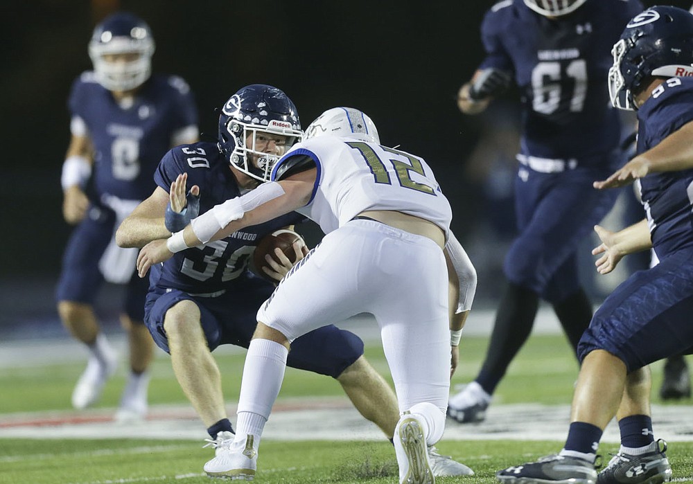 Greenwood running back Hunter Wilkinson (30) carries the ball, Friday, September 18, 2020 during a football game at Greenwood High School in Greenwood. Check out nwaonline.com/200919Daily/ for today's photo gallery.
(NWA Democrat-Gazette/Charlie Kaijo)