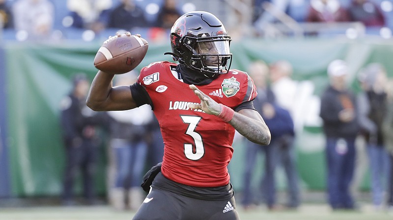 Louisville quarterback Micale Cunningham (3) plays against Mississippi State in the Music City Bowl on Dec. 30, 2019, in Nashville, Tenn. - Photo by Mark Humphrey of The Associated Press