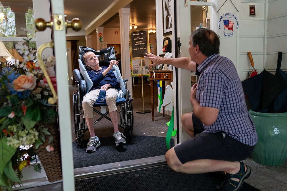 Dan Goerke, 61, visits his wife, Denise, at her assisted living facility in the Sandy Springs suburb of Atlanta on Aug. 5, 2020. Denise was diagnosed with Alzheimer's disease in 2012. MUST CREDIT: Photo for The Washington Post by Kevin D. Liles