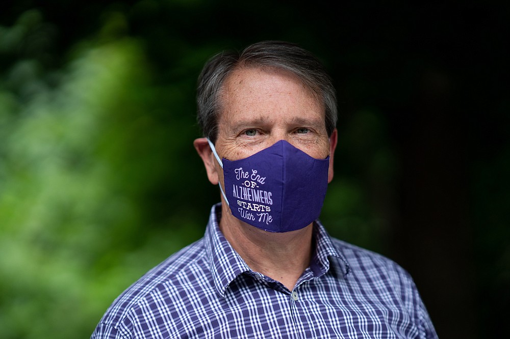 Dan Goerke, 61, visits his wife, Denise, at her assisted living facility in the Sandy Springs suburb of Atlanta on Aug. 5, 2020. Denise was diagnosed with Alzheimer's disease in 2012. MUST CREDIT: Photo for The Washington Post by Kevin D. Liles