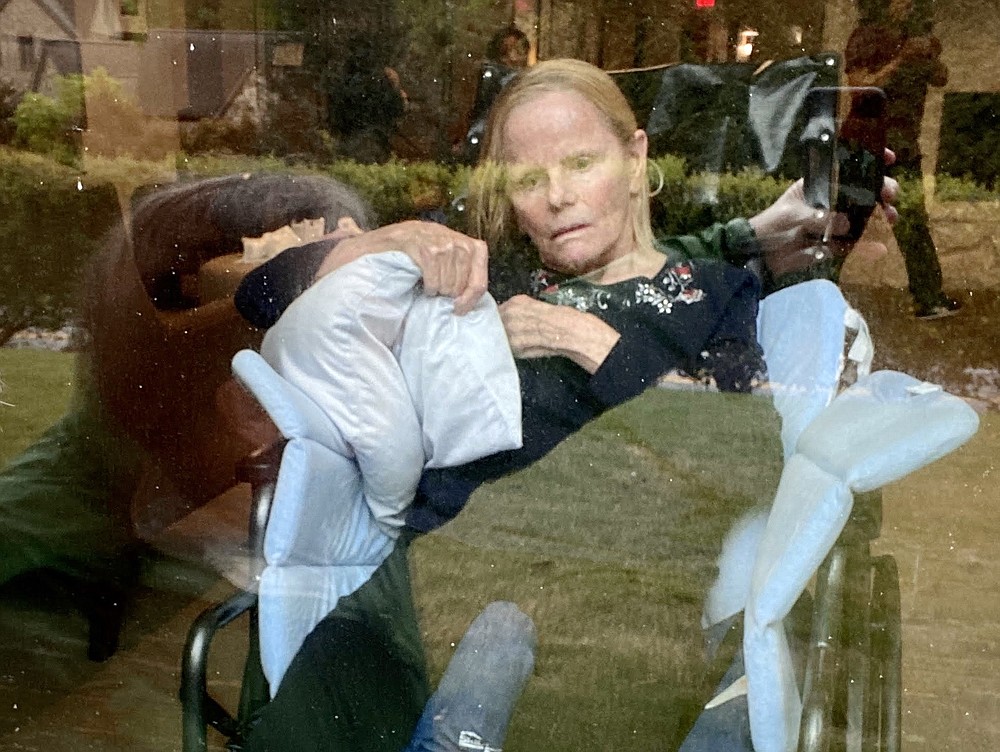 For the first few months of the pandemic, one of the few ways Dan Goerke could see his wife was through a window. But as she declined mentally, she stopped recognizing him and sat with a vacant stare. MUST CREDIT: Dan Goerke