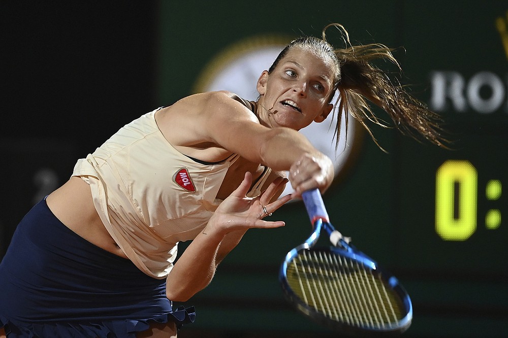 Czech Republic's Karolina Pliskova returns the ball to Belgium's Elise Mertens during their quarterfinals at the Italian Open tennis tournament, in Rome, Saturday, Sept. 19, 2020. (Alfredo Falcone/LaPresse via AP)