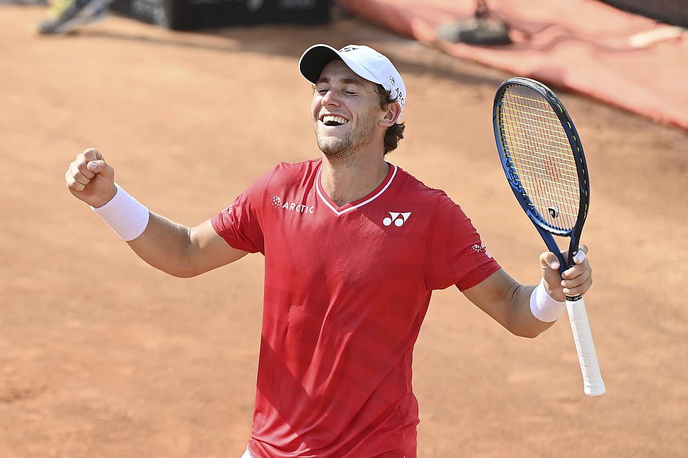 Casper Ruud celebrates beating Matteo Berettini during their quarterfinal match at the Italian Open tennis tournament, in Rome, Saturday, Sept. 19, 2020. (Alfredo Falcone/LaPresse via AP)