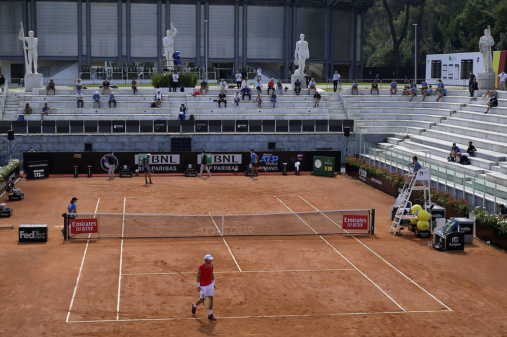 Casper Ruud and Matteo Berrettini play their quarterfinal match at the Italian Open tennis tournament, in Rome, Saturday, Sept. 19, 2020. (Alfredo Falcone/LaPresse via AP)