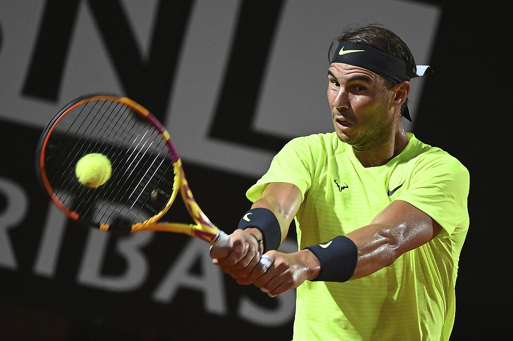 Spain's Rafael Nadal returns the ball to Argentina's Diego Schwartzman during their quarterfinals at the Italian Open tennis tournament, in Rome, Saturday, Sept. 19, 2020. (Alfredo Falcone/LaPresse via AP)